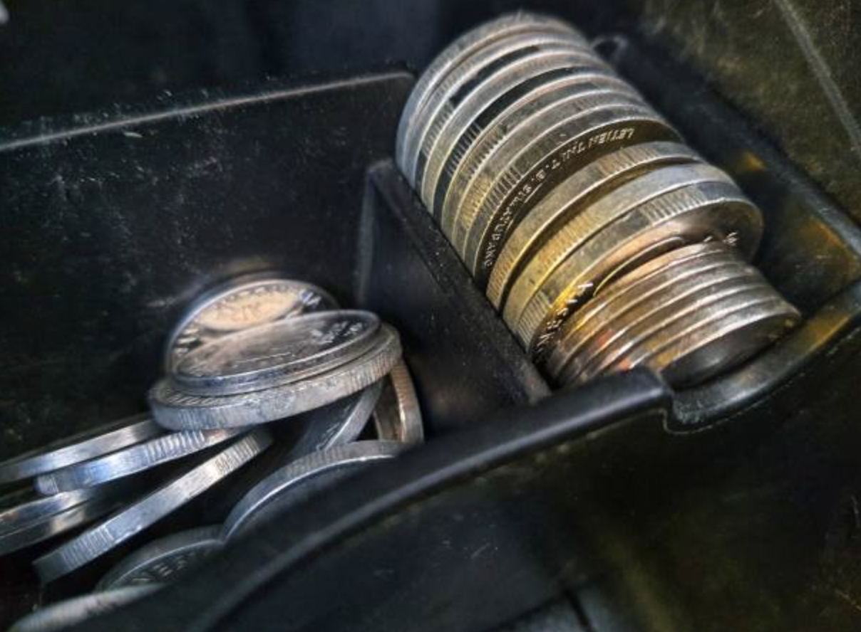 Loose change left behind in car for scrap at Abbey Scrap Cars